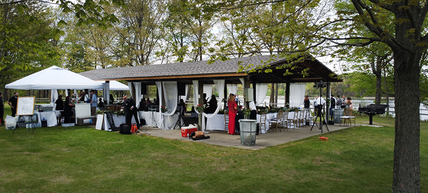 The pavilion facing the water is decorated for a wedding